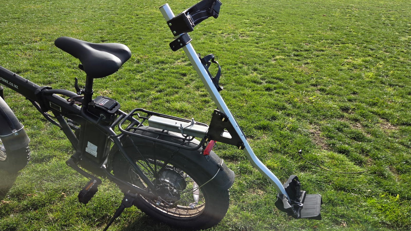 Top-down view of the golf bag holder attached to the bike
