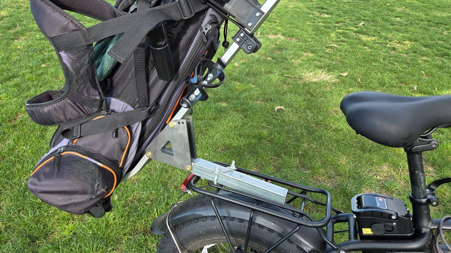 Full view of the Golf Bike Rack loaded with a golf bag